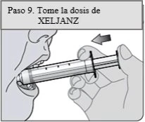 Illustration of a person inserting an needle-free syringe into the mouth to take a dose of XELJANZ, with a hand supporting it