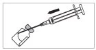 Technical drawing of a syringe with needle inserted into a glass vial, with a black arrow indicating the direction of liquid aspiration