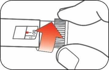 Two fingers rotating the knurled ring of a medical device upward