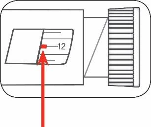 Technical diagram of a medical device with a red arrow indicating the mark at number 12 on an internal graduated scale