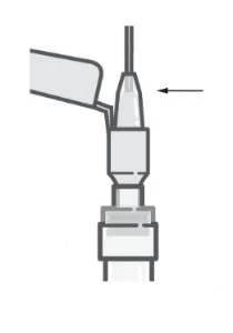 Diagramma tecnico in bianco e nero che mostra il dettaglio di un dispositivo medico con una freccia che indica una specifica parte superiore