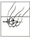 A hand holding a syringe horizontally, with fingers wrapped around the body of the device for drug administration
