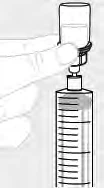 A hand holding a glass vial with liquid, attaching it to the top of a graduated syringe for withdrawal