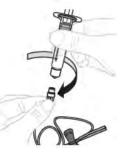A hand rotating the upper part of a medical device downward to engage a small snap-on component