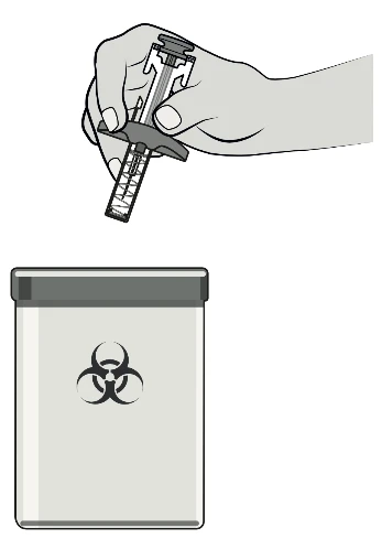 Una mano tiene una siringa pronta per l'uso sopra un contenitore per lo smaltimento di rifiuti biologici con simbolo di rischio biologico