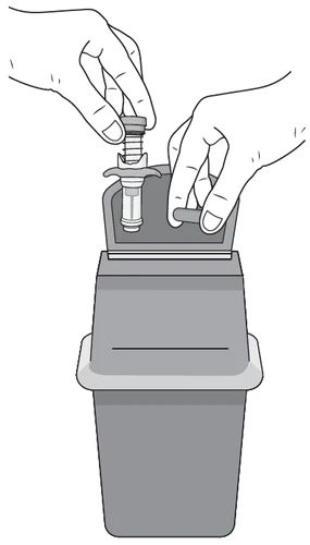 Two hands handling a cylindrical medical device to insert it into a gray plastic container with an open lid