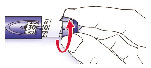 A hand rotating the upper part of an injection pen counter-clockwise