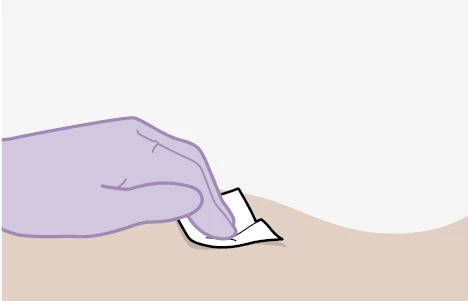 A gloved hand applying a small white adhesive bandage to the skin of an arm or leg