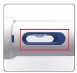 Detalle de un dispositivo médico blanco con una ventana de control ovalada con borde rojo que muestra un indicador azul en el