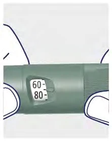 Close-up of a gray cylindrical medical device with a numerical indicator showing values 60 and 80 on a white scale