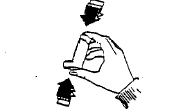 One hand holding a small cylindrical object between thumb and index finger with two black arrows indicating pressing motions towards the