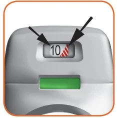 Detail of a medical device with a display showing the number 10 next to a red dashed section indicated by two black arrows
