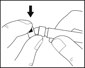 Two hands pressing and separating components of a medical device with a black downward-pointing arrow indicating movement