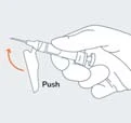 A hand gripping a syringe with a curved orange arrow indicating downward pushing motion with the label Push