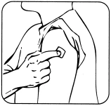 A hand applying a small square patch to the upper arm of a person using the index finger