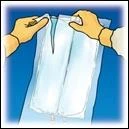 Two hands carefully open a transparent white plastic pouch against an intense blue background