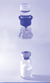 One transparent glass vial with grey cap and a transparent and blue plastic medical device placed on a white background