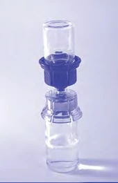 Small transparent glass vial with dark rubber stopper and plastic top part for