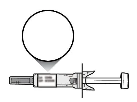 Disegno tecnico di una siringa orizzontale con un cerchio vuoto sopra la parte superiore del cilindro per indicare un punto di riferimento