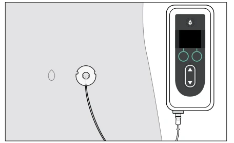 Rectangular medical device with screen and buttons connected by cable to a circular sensor placed on a light-colored surface
