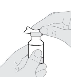 Two hands hold a glass vial while one hand gently lifts the upper protective cap