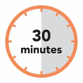 Circular clock with orange border and white background, right half highlighted in gray and black text '30 minutes' in the center