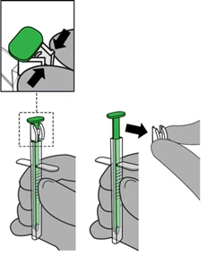 Diagram showing how to press the upper green button of a medical device with the thumb to activate the internal mechanism