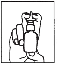 Una mano tiene verticalmente un piccolo flacone con erogatore a spray rivolto verso l'alto per l'uso nasale