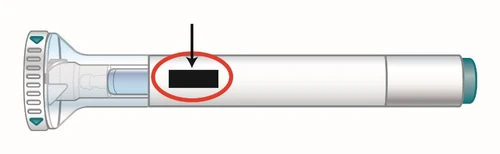 Horizontal diagram of a cylindrical white medical device with a black arrow pointing to a black rectangle circled in red