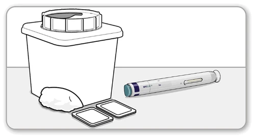 Contenitore bianco per smaltimento con coperchio accanto a una penna iniettore e due piccoli contenitori rettangolari bianchi su superficie chiara