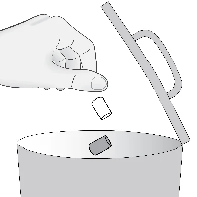 One hand lifting the lid of a cylindrical container while a small cap is being removed and falling down