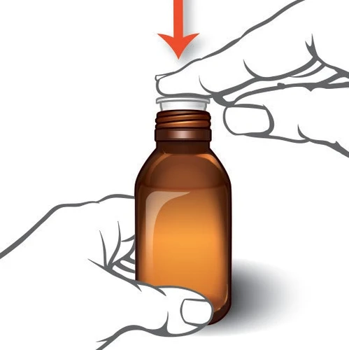 One hand holds a brown glass vial while the