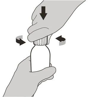 A hand presses downward on the cap of a vial while the