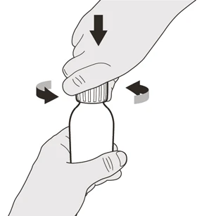 A hand presses downward on the cap of a vial while the