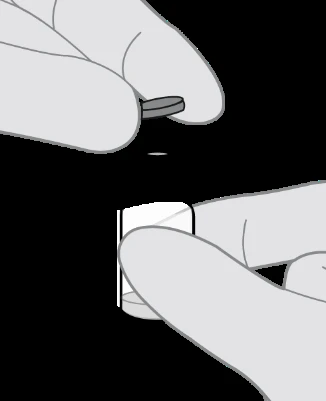 Two hands separating a tablet from a white blister pack on a dark background in two distinct steps