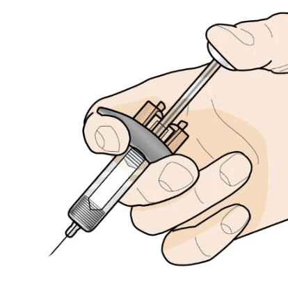 A hand holding a syringe with needle pointing downward and a finger pressing the plunger to inject liquid from the transparent cylinder