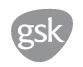 Logo GSK composto dalle lettere minuscole bianche su una forma irregolare e arrotondata di colore grigio scuro