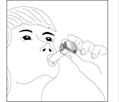 Line drawing of a person holding an inhaler in their hand and positioning it in front of their mouth for