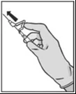 A gloved hand holding a syringe with the needle pointing upward