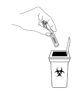 A hand holding a syringe preparing to dispose of it into a biohazard waste container with the biohazard symbol