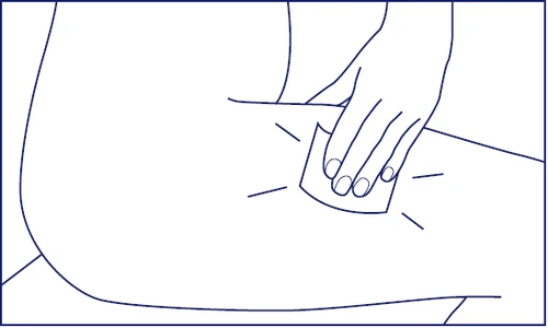 A hand pressing a tissue or gauze onto the skin of a person's thigh to apply pressure to a specific site