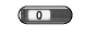 A horizontal medical device with a dark body and a central rectangular white window displaying the number zero in black