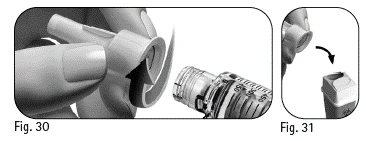 A hand rotates a white protective cap to remove it from a transparent graduated syringe as shown in figures 30 and 31