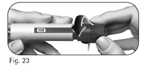 Two hands hold a cylindrical medical device while one hand rotates the dark terminal part to the right to set the dosage indicated as 125