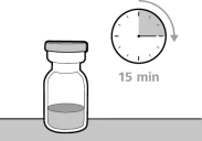 Medicine vial next to a clock with an arrow indicating the passage of 15 minutes