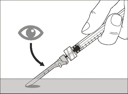 A hand holds a syringe with needle pointing downward and a symbol of an eye with an arrow indicating the tip of the