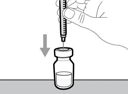 A hand holds a syringe with needle pointing toward the cap of a glass vial containing liquid with a downward arrow