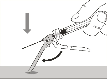 A hand holds a syringe with needle pointing downward while a lever is lowered with a curved motion toward the surface