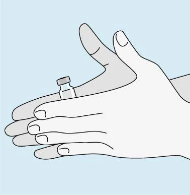 Two hands gently holding a small glass vial with a gray stopper on a light blue background