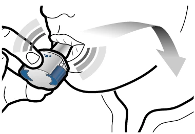A hand pressing a cylindrical medical device against the skin of the thigh with an arrow indicating downward movement